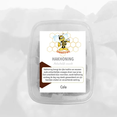 Productfoto Hakhoning Cola, Een snoepje met een rijke historie in Plastic kuipje met deksel 140g