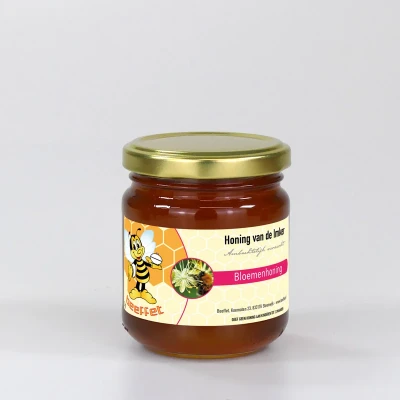 Productfoto Bloemenhoning, Pure rauwe honing (Letland) in Glazen pot met deksel 250g