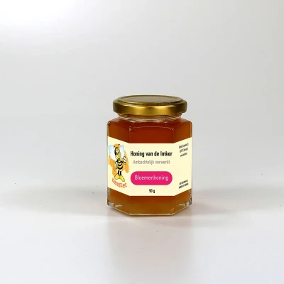 Productfoto Bloemenhoning, Pure rauwe honing (Spanje) in Glazen pot met deksel 50g