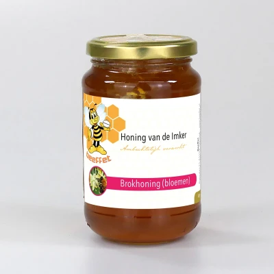 Productfoto Brokhoning van bloemenhoning (Nederland) in Glazen pot met deksel 450g