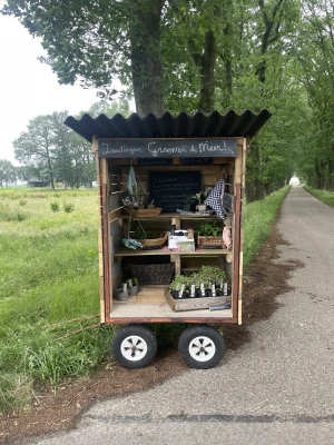 Afbeelding Brandnetelboerin groentekraam